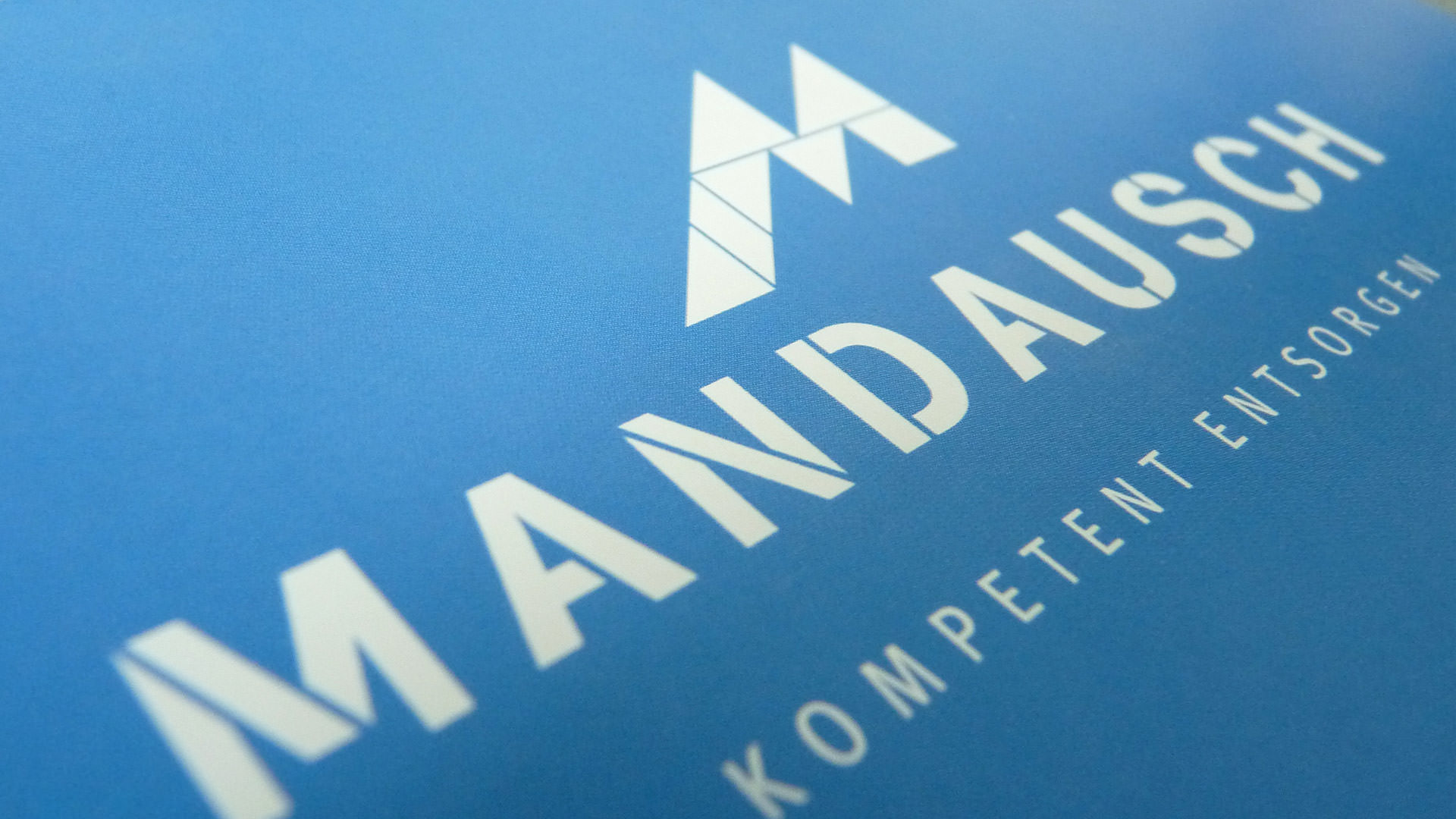 Mandausch-prev Mandausch – Entsorgungsprofi Logo invers