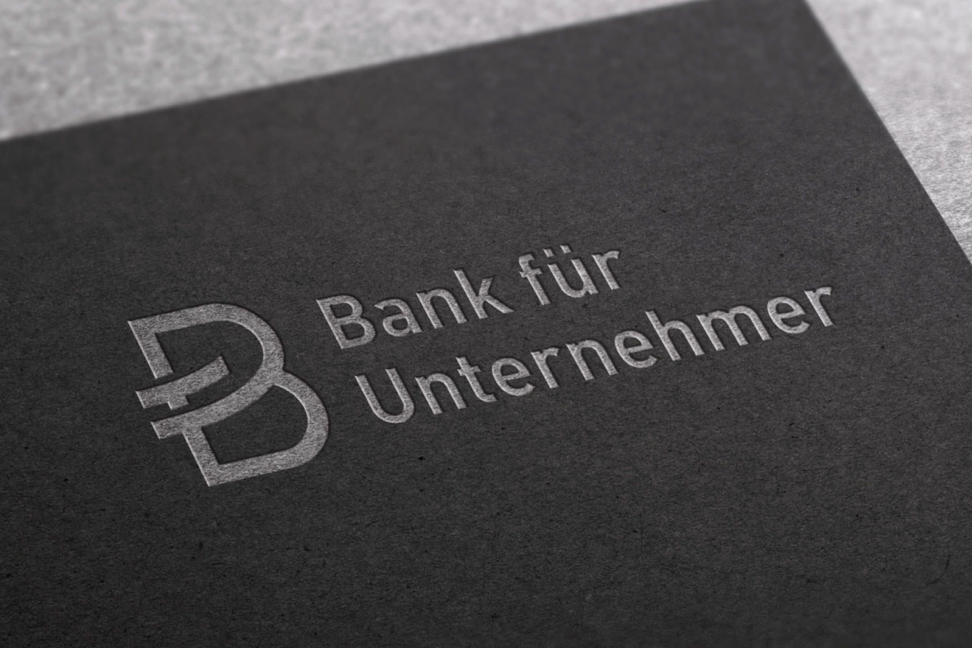 Bank für Unternehmer Logo Prägung